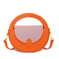 Bolso redondo vintage naranja y morado con textura tejida y cierre de metal dorado - Naranja