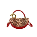 Red and leopard print semi-circle handbag with a golden twisted metal ring handle - Red