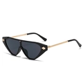 Fashionable black cat-eye sunglasses with gold arrow accents and metallic temples - Black Frame Gray Lens