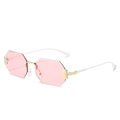 Octagonal rimless sunglasses with light pink lenses and white temples with gold accents - Gold Frame Pink Lenses