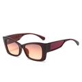 Occhiali da sole cat-eye con montatura marrone, lenti sfumate arancioni e dettaglio rosso - Montatura Tè Lenti Tè Rosa