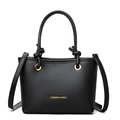 Chic black litchi pattern leather handbag with knot handles and crossbody strap - Black