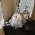 Silver geometric triangle backpack with metallic finish and cute cartoon doll pendant - Silver