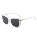 White cat-eye sunglasses with gold metal accents and dark grey lenses in 45-degree view - White Frame Gray Lens