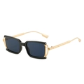 Square black sunglasses with blue lenses and gold metal temples in a side view - Black Frame Grey Lens