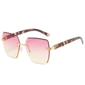 Frameless sunglasses featuring pink-yellow gradient lenses and tortoiseshell temples - Gold Frame Pink Yellow Lens
