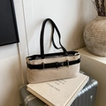 Elegante borsa tote in tela con finiture in pelle nera e fibbia su una valigia - Nero