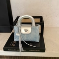 Mini borsa in denim trapuntato con chiusura a cuore argento e manico metallico - Argento Senza Ciondolo