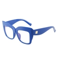 Oversized navy blue cat-eye glasses with gold temple accents on white background - Sea Blue