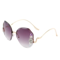 Rimless geometric sunglasses for women with purple gradient lenses and rhinestone floral accents - Gold Frame Gradient Gray
