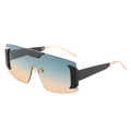 Lunettes de soleil bouclier oversize avec verres dégradés bleu-orange et branches dorées - Monture Noire Verres Vert Jaune