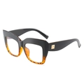 Montatura cat-eye nera e tartarugata con rivetto in metallo dorato sull'asta - Modello in Contrasto / Montatura Nero Superiore Tartarugato Inferiore