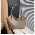 Minimalist beige pebble leather tote bag with wavy top edge and metallic gold plate - Khaki