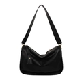 Minimalist black wide strap crossbody shoulder bag with sleek textured leather finish - Black