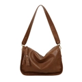 Minimalist brown crossbody pillow bag with wide shoulder strap and tassel detail - Brown