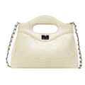 Quilted cream shoulder bag with metallic chain strap and unique cutout handle design - Yellow