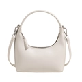 White minimalist croissant-style shoulder bag with top handle and adjustable strap - White