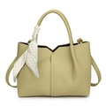 Chic light green lychee leather tote bag featuring a decorative silk scarf and strap - Green