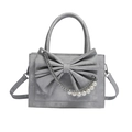 Silver textured handbag with large bow, pearl chain strap and shoulder bag versatility - Silver