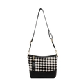 Checkerboard bucket bag with black leather base, wide strap and tassel charm - Black