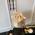 Elegant champagne gold satin drawstring bucket bag with pearl handle and ribbon detail - Beige