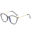 Occhiali TR90 retrò con montatura tonda nera ondulata, stanghette oro e lenti blu - Montatura Nera
