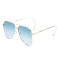 Aviator sunglasses featuring a gold metal frame and blue gradient lenses shown from a side view - New Style / Gold Frame Gradient Blue