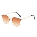 Modieuze randloze zonnebril met thee verloopglazen en gouden metalen frame - Gouden Frame Verloop Thee Lens
