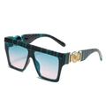 Oversized square sunglasses with green striped frames and gradient lenses at a 45-degree angle - Green Striped Frame Green Pink Lens