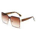 Oversized rimless sunglasses featuring brown gradient lenses and stylish leopard temples - Leopard Frame Gradient Brown Lens