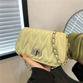 Pale yellow quilted leather shoulder bag with wave pattern and silver chain strap - Yellow-Green