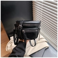 Minimalist black PU leather crossbody bag with multiple zippers and adjustable strap - Black