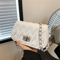 White quilted shoulder bag with rhinestone buckle and silver chain strap - White