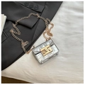Close-up of silver crocodile embossed mini square bag with gold chain strap detail - Silver