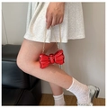 Chic red bow-shaped evening clutch bag with metallic finish and gold chain strap - Red