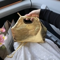 Metallic gold textured faux leather handbag with integrated handle and pleated design - Bright Gold