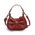 Mini red bow shoulder bag for girls with glossy finish and silver-tone hardware - Red