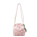 Pink lychee textured bucket bag with drawstring and elephant charm detail - Pink