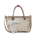 Straw woven tote bag with light brown PU trim and a large pearl lace bow charm - Off White