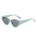 Occhiali da sole cat-eye verde menta vintage con lenti grigie e dettagli dorati - Montatura Verde Lenti Grigie