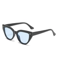 Fashionable black cat eye sunglasses with light blue lenses and silver rivet details - 2112 / Black Frame Blue Lens