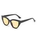 Fashionable black cat eye sunglasses with yellow lenses and silver rivet accents - 2112 / Black Frame Yellow Lens