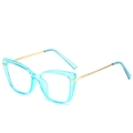 Lunettes œil-de-chat avec monture sarcelle translucide et branches dorées élégantes - Montures vertes normales (incl. TVA 13 %) / Style Chaud