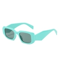 Modern mint green rectangular sunglasses with thick frames and dark lenses in side view - Green Frame Grey Lens