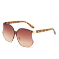 Lunettes de soleil oversize en forme de pomme avec verres dégradés marron et écaille - Monture Dorée Verres Ambrés Dégradés