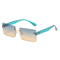 Square fashion sunglasses with blue-orange gradient lenses and translucent teal temples - Green Frame Green Tea Lens