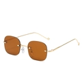 Retro rimless sunglasses featuring amber tea lenses and slim golden metal temples - Gold Frame Tea Lens