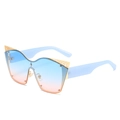 Oversized cat-eye sunglasses with blue-pink gradient lenses and gold filigree accents - Blue Legs Blue Pink Lens