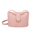 Minimalist soft leather crossbody bucket bag in light pink with round button detail - Pink