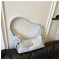 Close-up of light gray patent leather baguette bag with side flap pockets and glossy finish - Blue